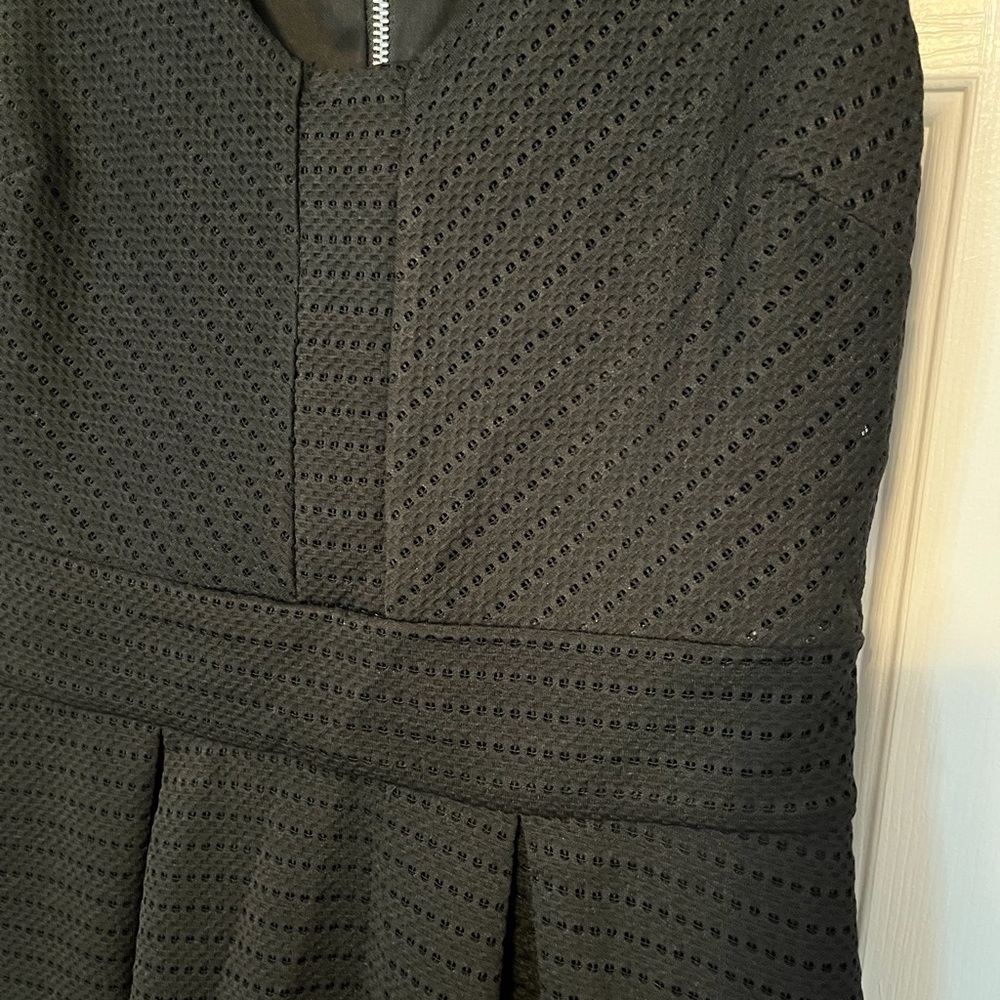 Jennifer Lopez crochet black flare dress